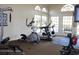 Fitness center featuring modern exercise equipment and large windows for natural light at 700 Daniel Ellis Dr # 6107, Charleston, SC 29412
