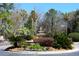 Beautiful water fountain as community focal point surrounded by tropical landscaping and flowering plants at 700 Daniel Ellis Dr # 6107, Charleston, SC 29412