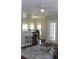 Inviting living area with dark wood flooring, bright light, and ceiling fan offers a great place to relax at 700 Daniel Ellis Dr # 6107, Charleston, SC 29412