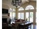Bright living room showcasing a fireplace, hardwood floors, and lots of natural light at 700 Daniel Ellis Dr # 6107, Charleston, SC 29412
