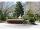 Well-maintained traffic circle with a classic fountain and lush landscaping at 700 Daniel Ellis Dr # 6107, Charleston, SC 29412