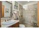 Bathroom with a glass shower, modern fixtures, and beautiful vanity at 7000 Palmetto Dr # 5A, Isle of Palms, SC 29451