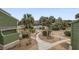 Scenic view of the condo community featuring lush landscaping and walking paths at 7000 Palmetto Dr # 5A, Isle of Palms, SC 29451