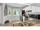 Bright kitchen with stainless steel appliances and a large window looking out onto the yard at 851 Sandlake Dr # F, Mount Pleasant, SC 29464