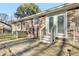 A brick patio leads to the back door and a spacious backyard, offering an inviting space for outdoor relaxation at 105 Alan Ct, Summerville, SC 29485