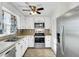 Traditional kitchen with stainless steel appliances, tile floors, and white cabinets at 105 Alan Ct, Summerville, SC 29485