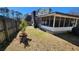 Backyard featuring a screened porch, a small tree and a privacy fence at 105 Ford Ct, Summerville, SC 29483
