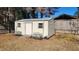 A backyard storage shed with a ramp, benches and fresh paint at 105 Ford Ct, Summerville, SC 29483