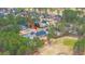 A top-down view highlighting homes bordering a golf course, blending residential living with natural beauty at 105 Pine Valley Dr, Summerville, SC 29483