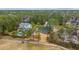 High angle shot featuring homes on a lush golf course with mature trees, and serene ponds at 105 Pine Valley Dr, Summerville, SC 29483