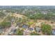 An aerial view of a community on a golf course with beautiful homes surrounded by lush greenery and mature trees at 105 Pine Valley Dr, Summerville, SC 29483