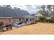 Spacious backyard boasts a large deck with outdoor seating, perfect for entertaining in a beautiful setting at 105 Pine Valley Dr, Summerville, SC 29483