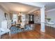 This spacious dining room features a stylish chandelier and hardwood floors, perfect for entertaining guests at 105 Pine Valley Dr, Summerville, SC 29483