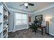 Well-lit home office featuring built-in shelving, a comfortable workspace, and neutral decor at 105 Pine Valley Dr, Summerville, SC 29483