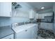 Well-equipped laundry room with modern appliances, ample counter space, and efficient storage at 105 Pine Valley Dr, Summerville, SC 29483