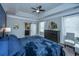 Spacious bedroom boasts tray ceilings, a serene blue accent wall, and ample natural light at 105 Pine Valley Dr, Summerville, SC 29483