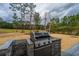 Outdoor kitchen area with built-in stainless steel grill, perfect for outdoor cooking and entertaining at 105 Pine Valley Dr, Summerville, SC 29483
