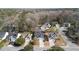 Aerial view showcases a charming neighborhood and tree-lined street at 109 Arbor Oaks Dr, Summerville, SC 29485