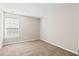 Simple carpeted bedroom with window and neutral-toned walls at 109 Arbor Oaks Dr, Summerville, SC 29485