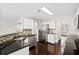 Open kitchen with stainless steel appliances, dark countertops, and ample cabinet space at 109 Arbor Oaks Dr, Summerville, SC 29485