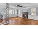 Inviting living room with hardwood floors, fireplace, and plenty of natural light at 1124 Berkeley St, Hanahan, SC 29410