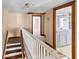 Staircase landing featuring access to bathroom and other rooms at 1124 Berkeley St, Hanahan, SC 29410