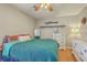 Inviting bedroom with hardwood floors, dresser, and soft, natural light at 114 Merrimack Blvd, Moncks Corner, SC 29461