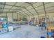 Spacious garage interior with ample storage for recreational equipment and tools at 114 Merrimack Blvd, Moncks Corner, SC 29461