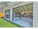 Spacious two-car garage with ample storage and boat parking offers versatile utility and convenience at 114 Merrimack Blvd, Moncks Corner, SC 29461