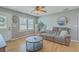 Comfortable living room features a plush sofa, round coffee table, and modern decor at 114 Merrimack Blvd, Moncks Corner, SC 29461