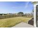 Expansive backyard with lush lawn, fountain, and privacy fence at 127 Garden Gate Way, Summerville, SC 29486