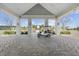 A golf cart parked in front of a building offers convenient transportation around the community at 127 Garden Gate Way, Summerville, SC 29486