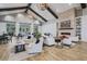 Community lounge with comfortable seating, a cozy fireplace, and plenty of natural light at 127 Garden Gate Way, Summerville, SC 29486