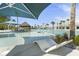 Luxurious community pool with lounge chairs and umbrellas at 127 Garden Gate Way, Summerville, SC 29486