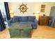 Cozy living room featuring a comfy couch, nautical themed decor, and chest style coffee table at 1300 Ocean Blvd # 221, Isle of Palms, SC 29451
