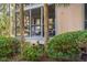 Exterior screened porch on condo with lovely green landscape views at 1407 Shipwatch Rd, Kiawah Island, SC 29455
