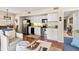 Bright kitchen with stainless steel appliances, white cabinets, and an open floor plan at 1407 Shipwatch Rd, Kiawah Island, SC 29455