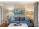 Inviting living room featuring stylish seating, coastal artwork, and hardwood floors at 1407 Shipwatch Rd, Kiawah Island, SC 29455