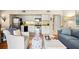 Open floor plan featuring a cozy living area, adjacent kitchen, and view into the hallway at 1407 Shipwatch Rd, Kiawah Island, SC 29455
