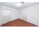 Bright bedroom featuring wood floors, natural light, and neutral walls at 1452 Glencoe Dr, Mount Pleasant, SC 29464