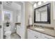 Nicely decorated bathroom with modern granite counters and tiled floors at 15 Back Ct, Isle of Palms, SC 29451