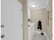 Bright laundry room featuring modern appliances, ample storage and tile flooring at 15 Back Ct, Isle of Palms, SC 29451