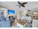 Cozy living room with a fireplace, TV, and comfortable seating arrangement at 15 Back Ct, Isle of Palms, SC 29451