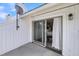 Private patio with sliding glass doors, perfect for relaxing and enjoying the outdoors at 15 Back Ct, Isle of Palms, SC 29451