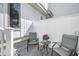 Cozy outdoor patio with seating and a tranquil view, perfect for relaxation at 15 Back Ct, Isle of Palms, SC 29451