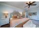 Serene bedroom features a comfortable bed, soft lighting, and tasteful decor for a relaxing retreat at 1529 Red Drum Rd, Mount Pleasant, SC 29466