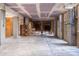 Large unfinished basement with concrete floors and exposed ceiling and support beams at 158 Sandshell Dr, Charleston, SC 29492