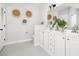 Stylish bathroom with double vanity, modern fixtures, and decorative wall art at 158 Sandshell Dr, Charleston, SC 29492