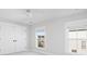 Bedroom featuring a spacious closet and two windows providing abundant light at 158 Sandshell Dr, Charleston, SC 29492