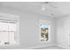 Bright bedroom with two windows providing great views of the surrounding community at 158 Sandshell Dr, Charleston, SC 29492